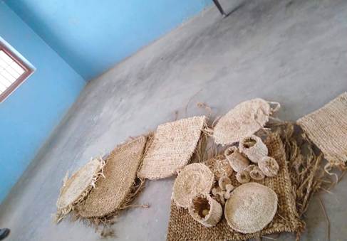 A group of woven objects on a floor
Description automatically generated